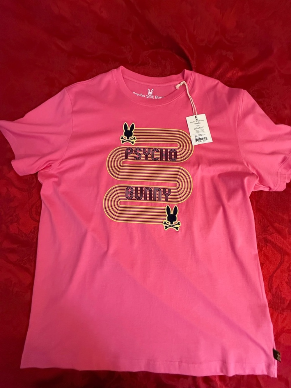 Psycho Bunny Tango Pink Graphic Tee with Multi-Color Stripes